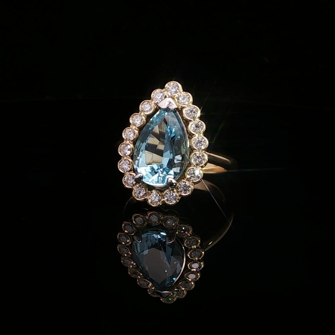 Pear-Shaped Aquamarine & Diamond Halo Ring in 18ct Yellow Gold