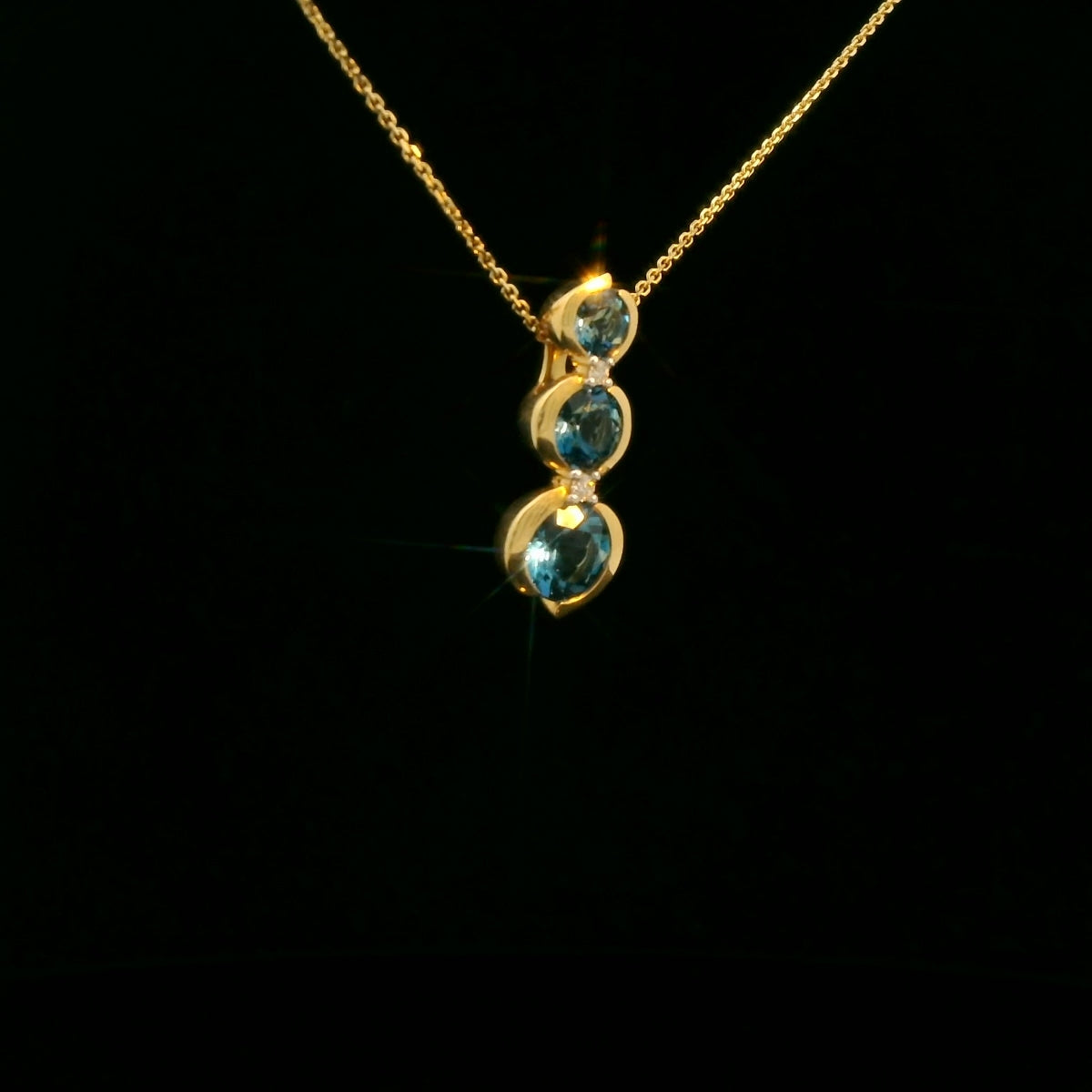 London Blue Topaz & Diamond Pendant in 18ct Yellow Gold
