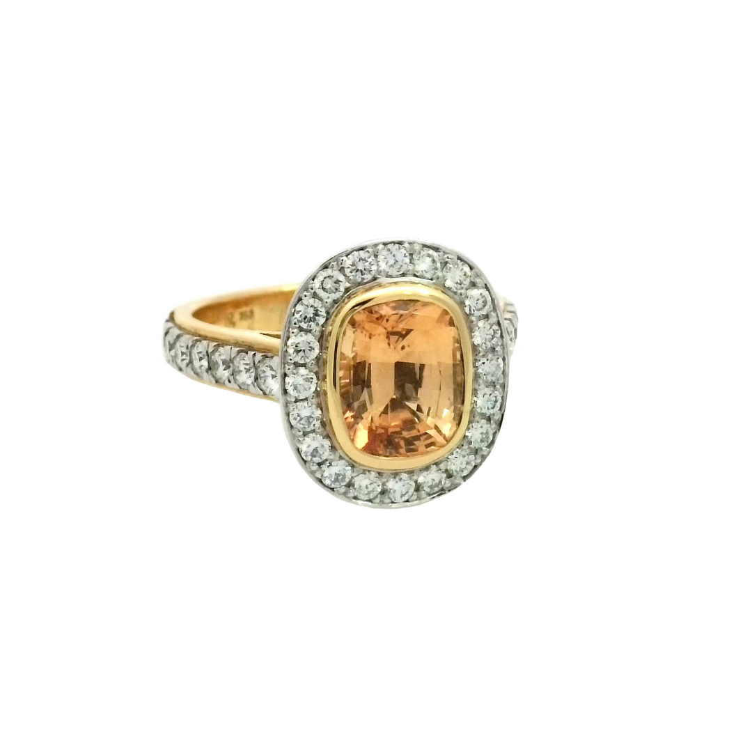 Orange Sapphire & Diamond Halo Ring