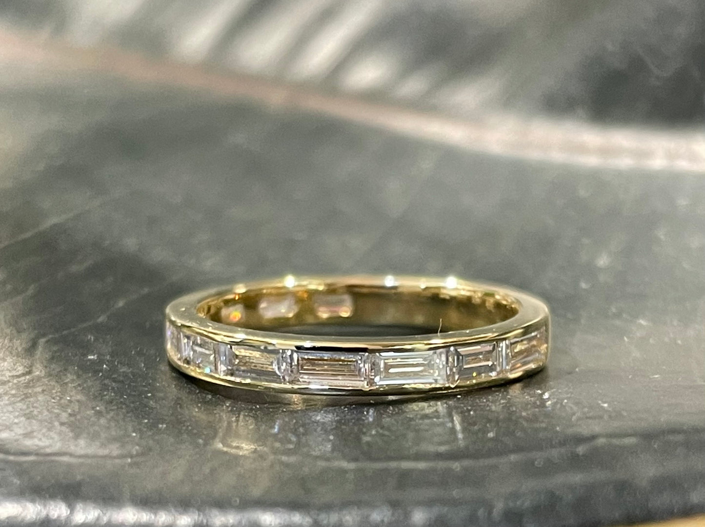 baguette cut channel set wedding band