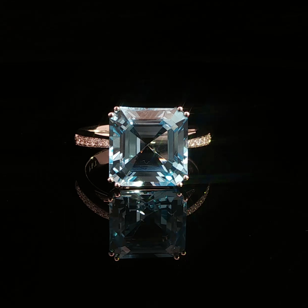 Emerald Cut Blue Topaz & Diamond Ring in 18ct White Gold