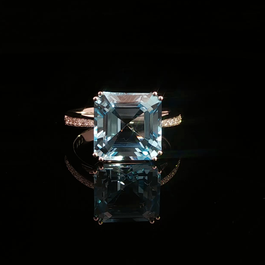 Emerald Cut Blue Topaz & Diamond Ring in 18ct White Gold