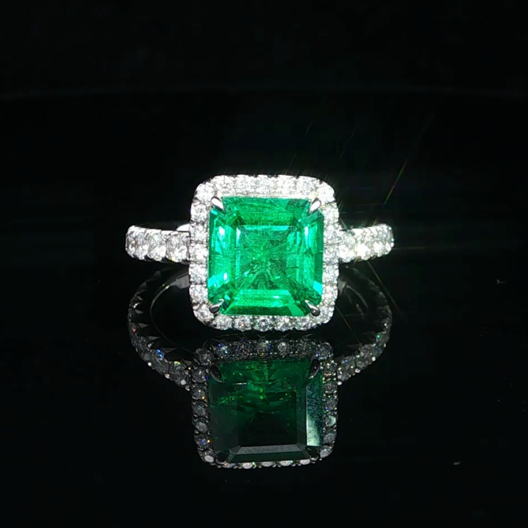 Emerald Cut Colombian Emerald Halo Ring in Platinim 
