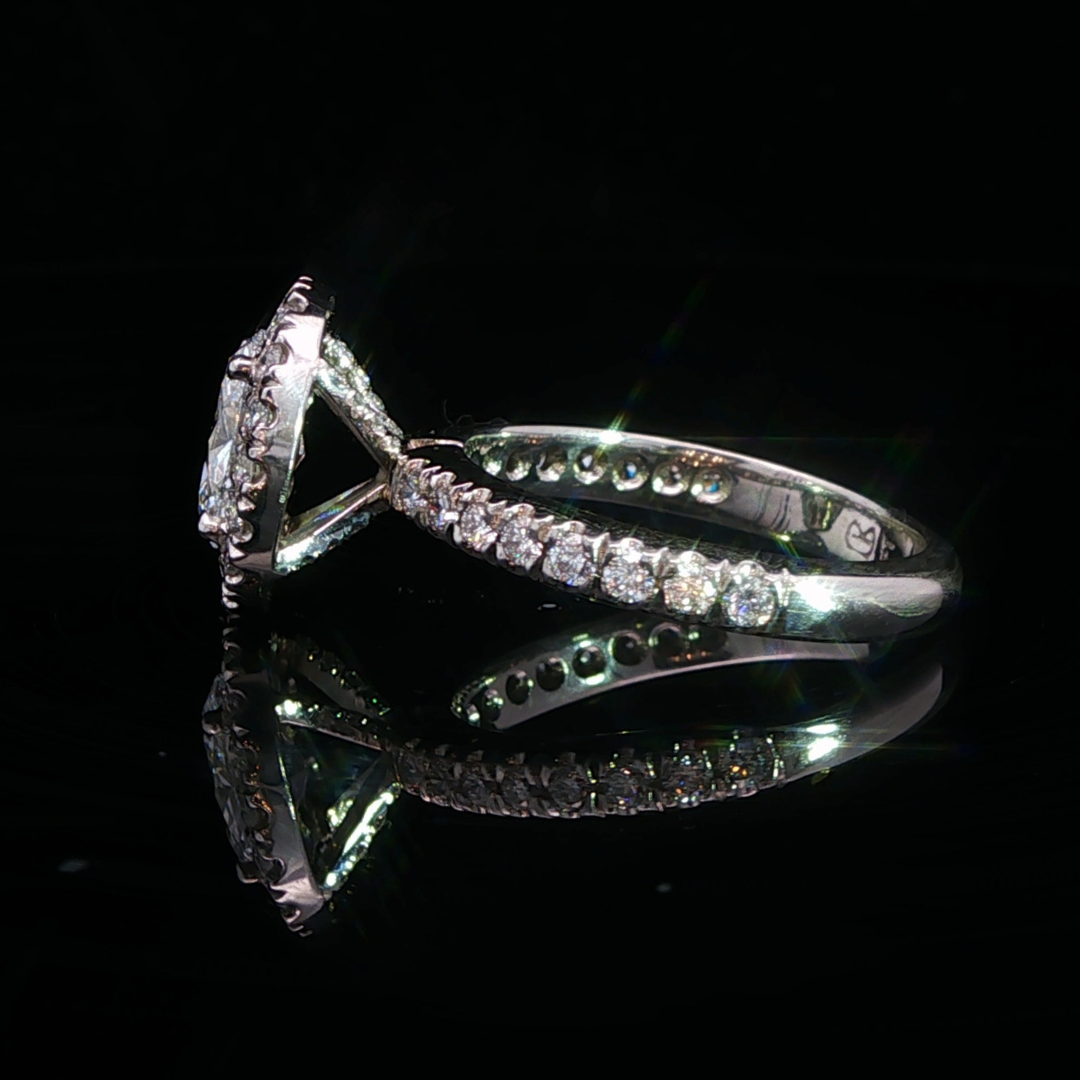 Oval Cut Diamond Halo Engagement Ring in Platinum | Brinkhaus Jewellers