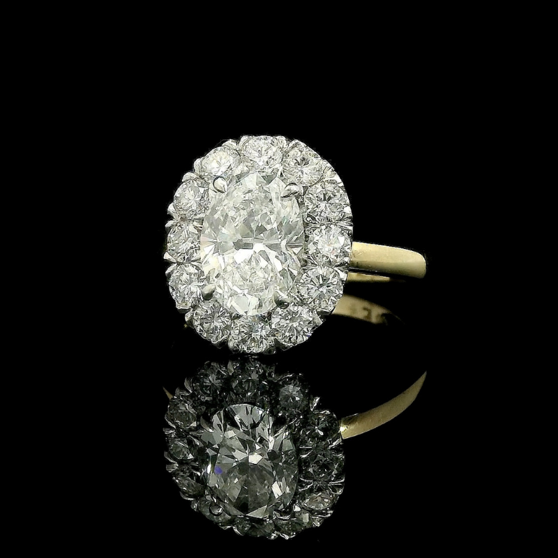 Oval Cut Halo Engagement Ring in Platinum & 18ct Yellow Gold | Brinkhaus Jewellers Claremont