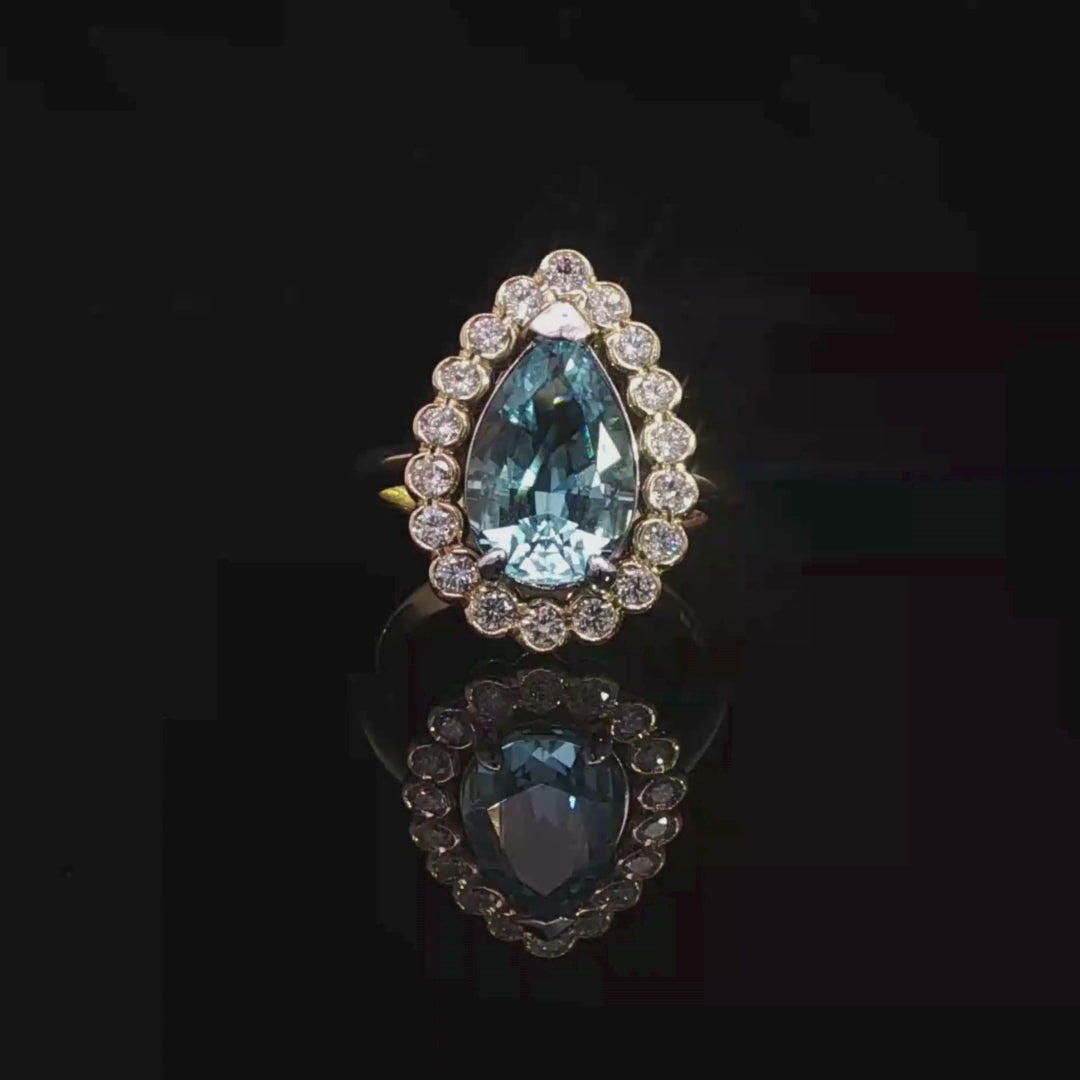 Pear-Shaped Aquamarine and Diamond Halo Ring in 18ct Yellow Gold 