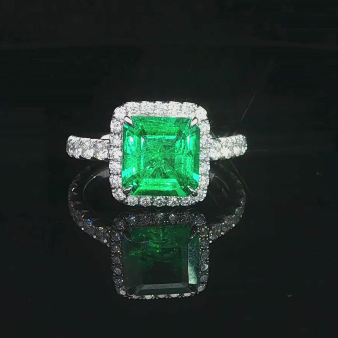 Emerald Cut Colombian Emerald Halo Ring in Platinim 